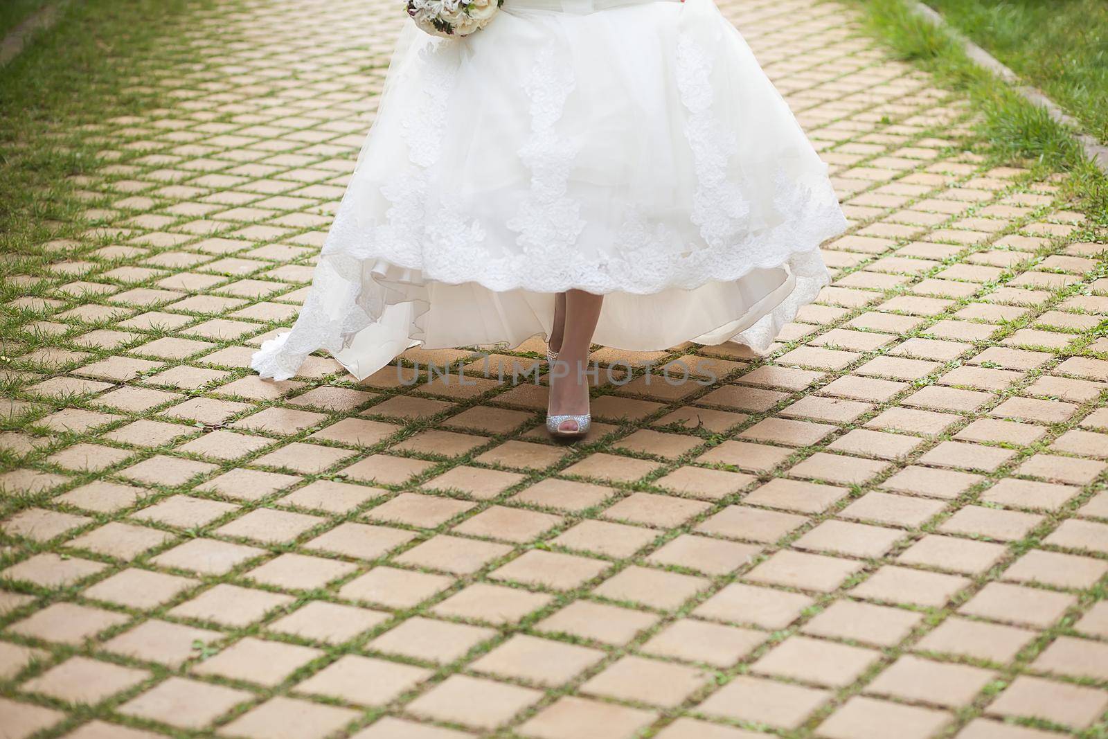 Beautiful pink bride's shoes elegant high heels stylish beige shoes decorated with rhinestones beautiful and elegant shoes of a young girl