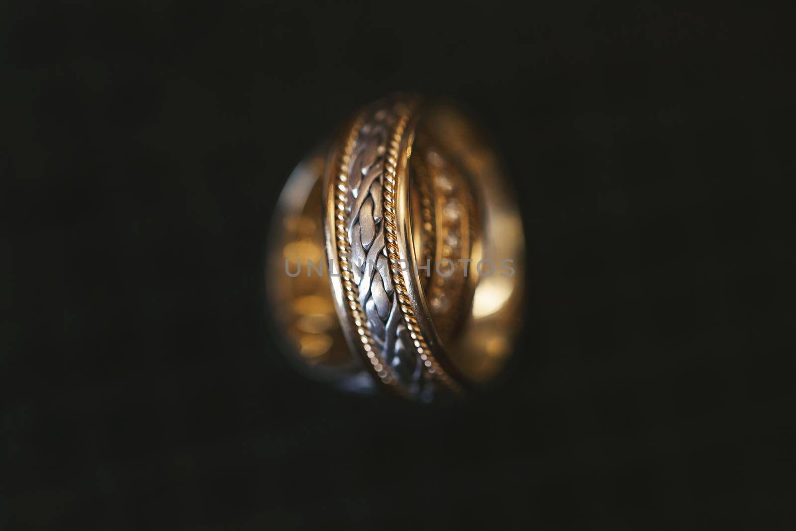 Two gold wedding rings close-up. Macro shooting.