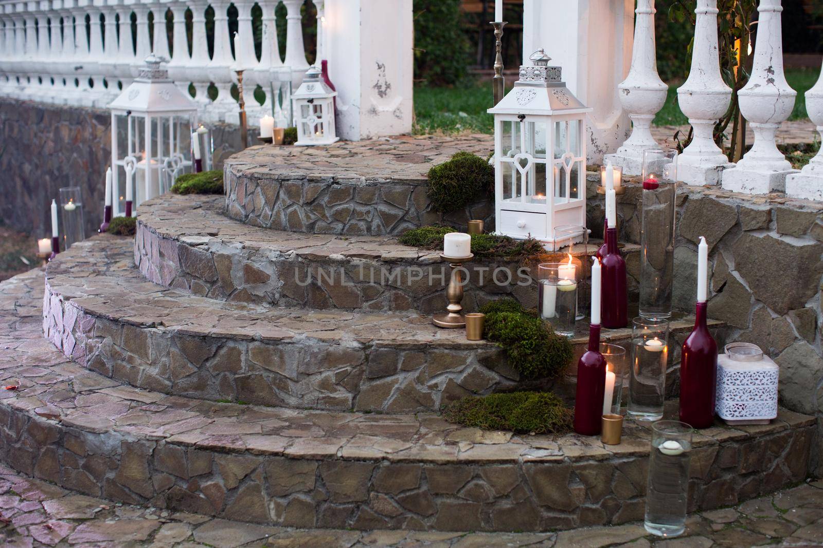 wedding decor with flowers and bottle candles