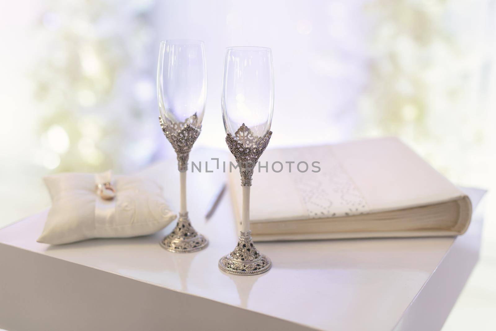 Wedding glasses with champagne on the table