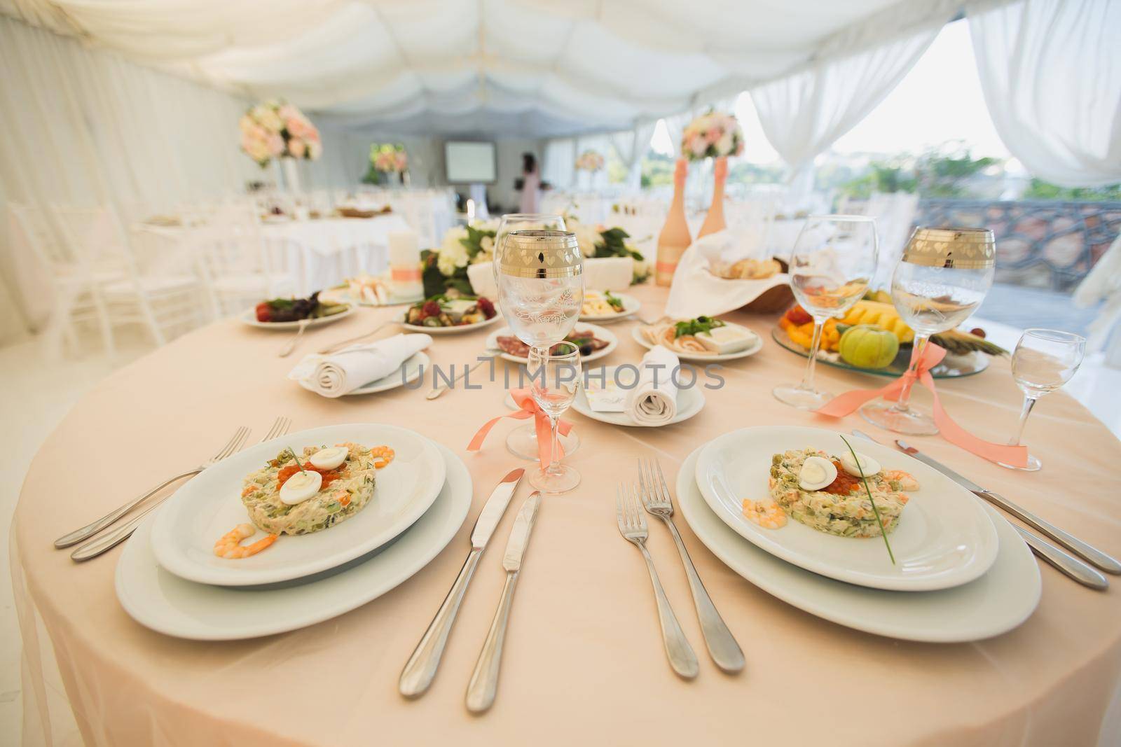 Beautiful Banquet hall under a tent for a wedding reception.