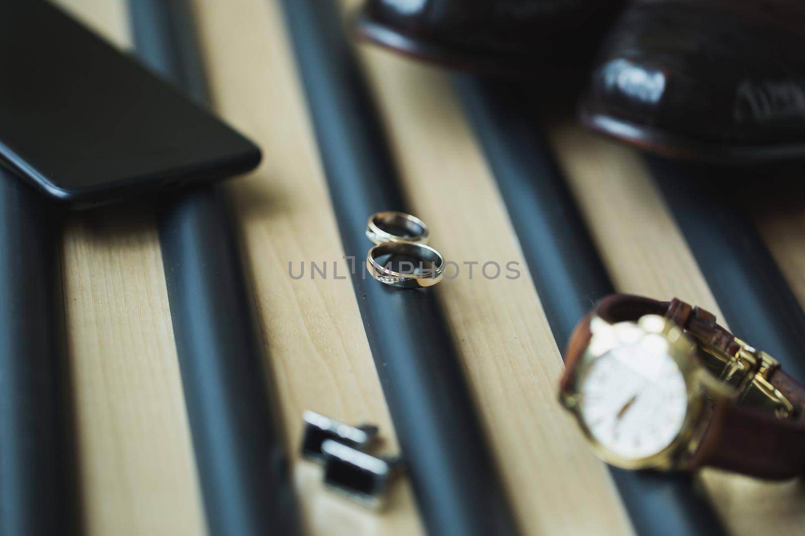 Groom's accessories: rings, watches cufflinks leather shoes
