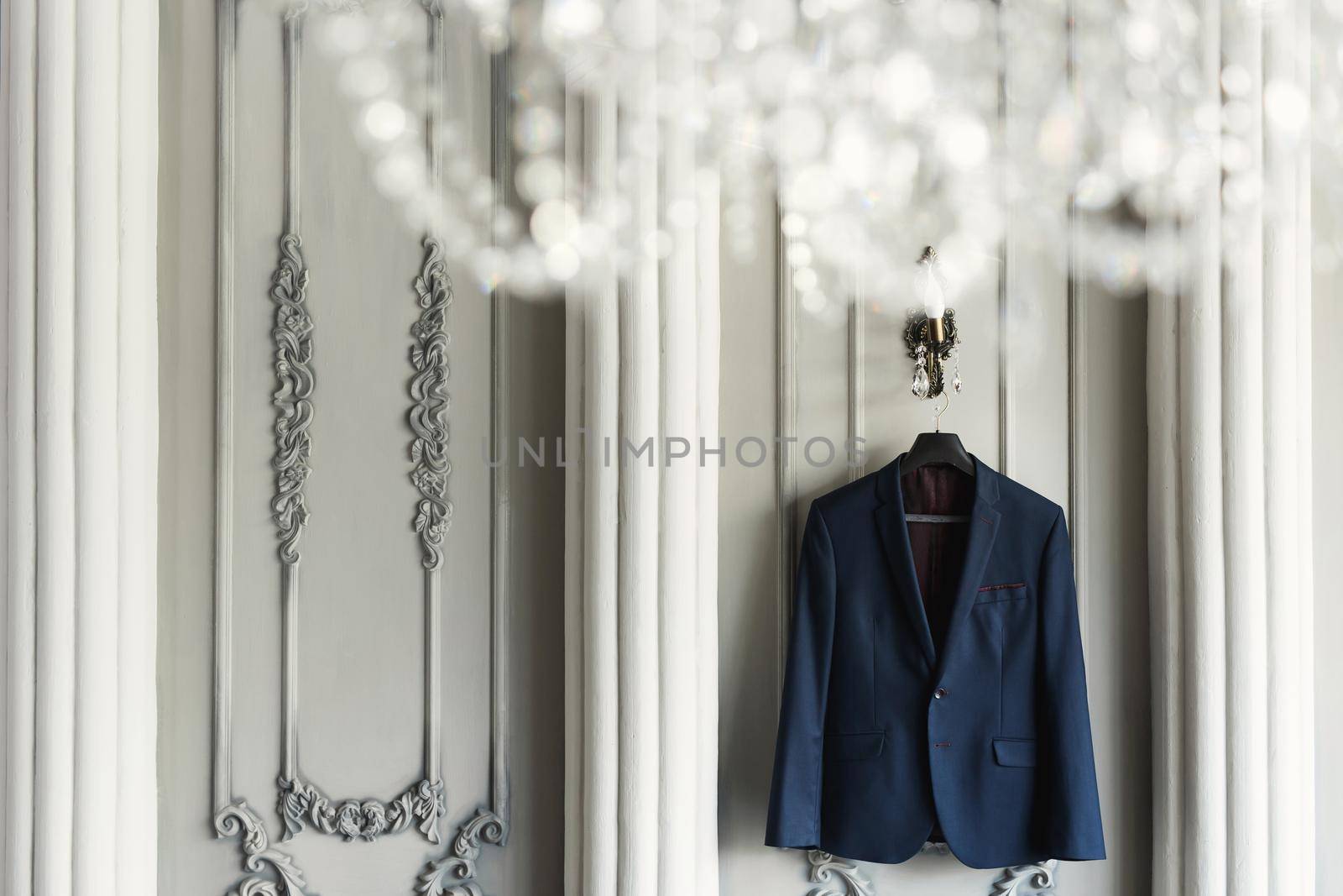 Blue men's wedding suit during the groom's gathering by StudioPeace