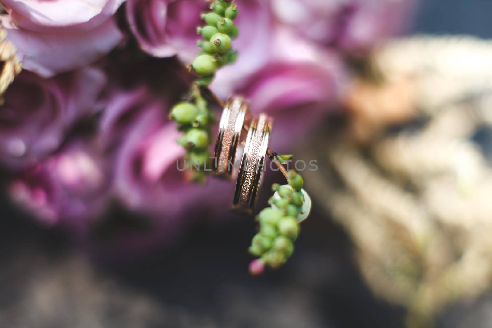 Wedding rings of the bride and groom.