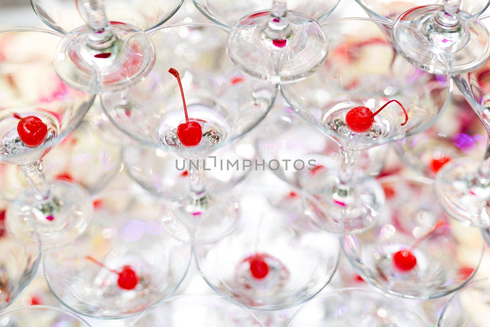 Pyramid of glasses, cherry in the glass. by StudioPeace