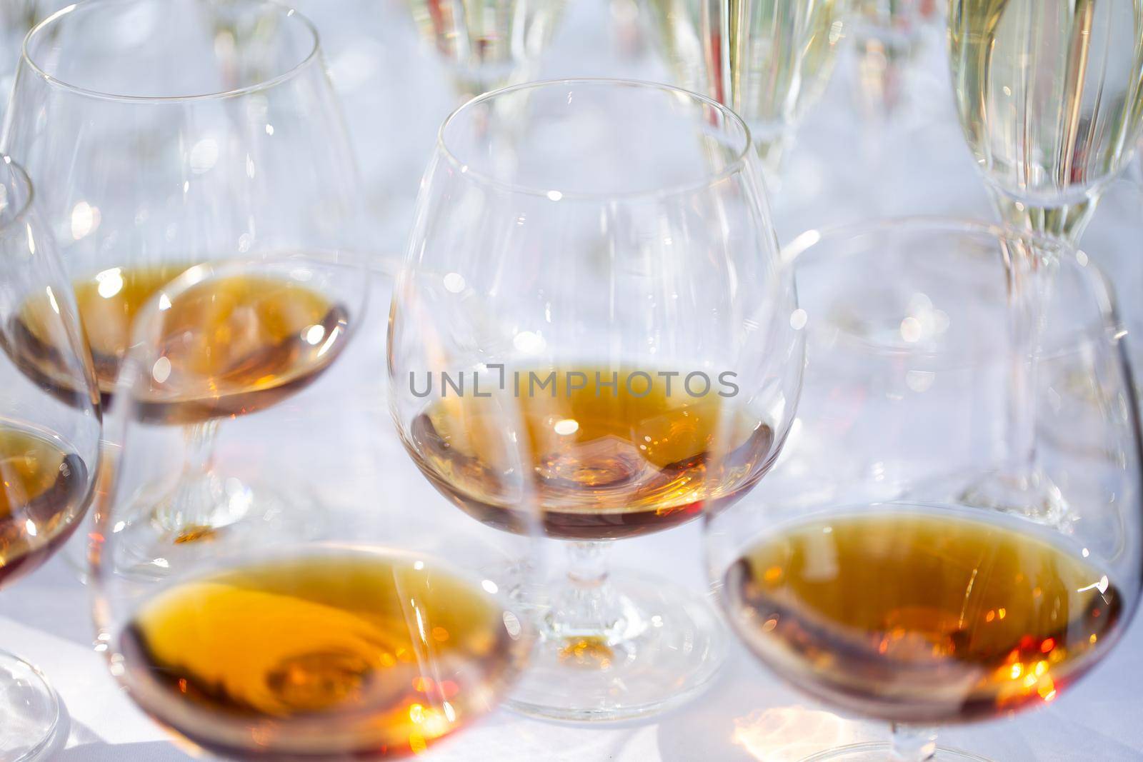 Glasses of alcohol close- up before a party in a cafe