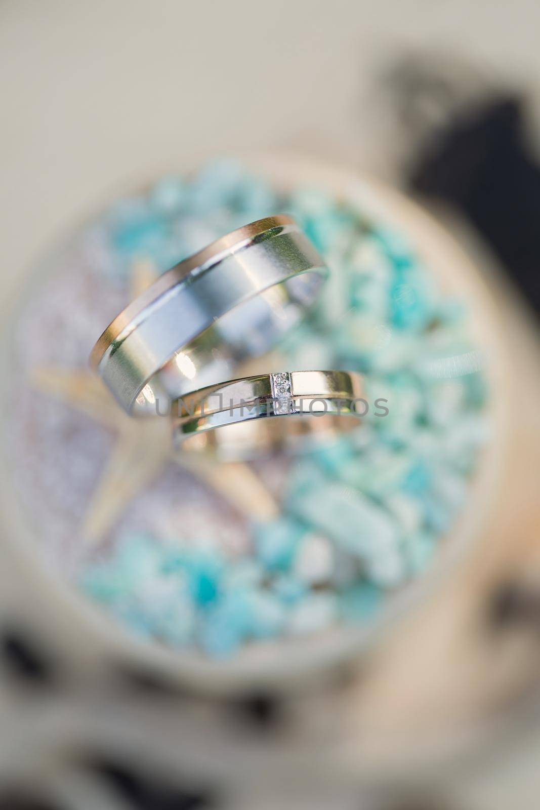 Wedding rings in a decorative jewelry box by StudioPeace