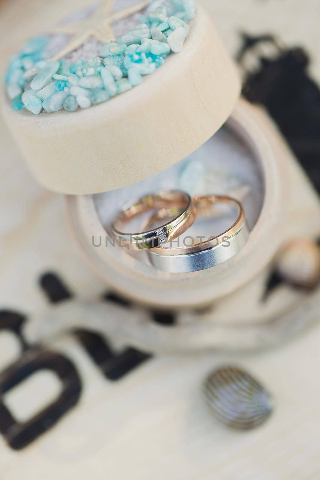 Wedding rings in a decorative jewelry box by StudioPeace