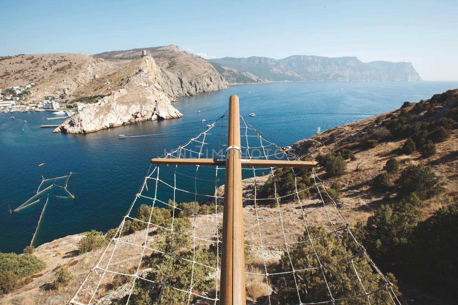 Luxurious wedding ceremony on a ship with a view of the sea and mountains.