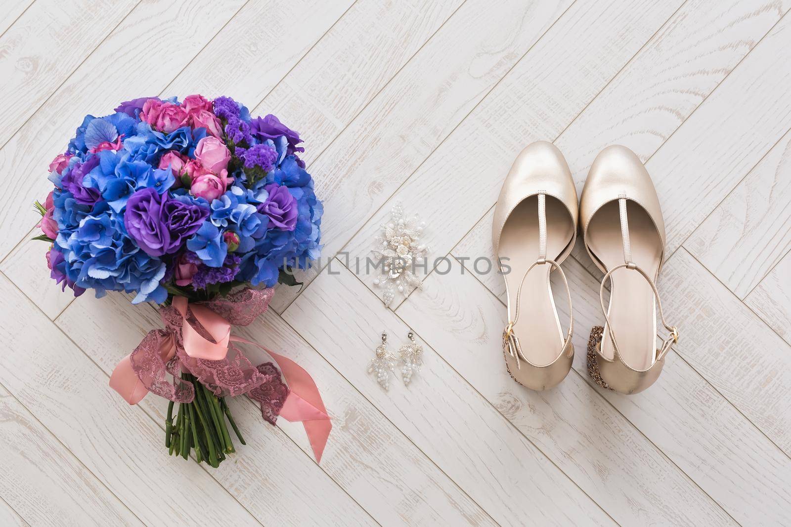 Elegant wedding accessories of the bride in the morning on the day of the celebration by StudioPeace