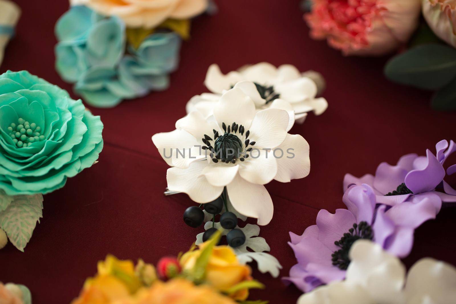 Colorful of artificial flower decoration. The fabric flowers bouquet.