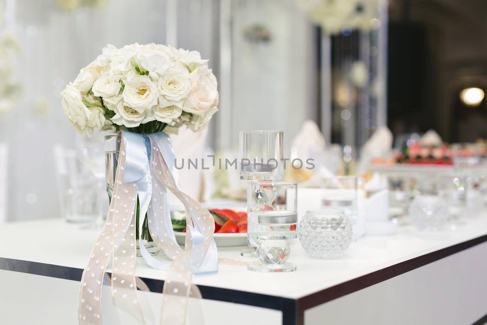 Served wedding banquet table with dishes in the restaurant