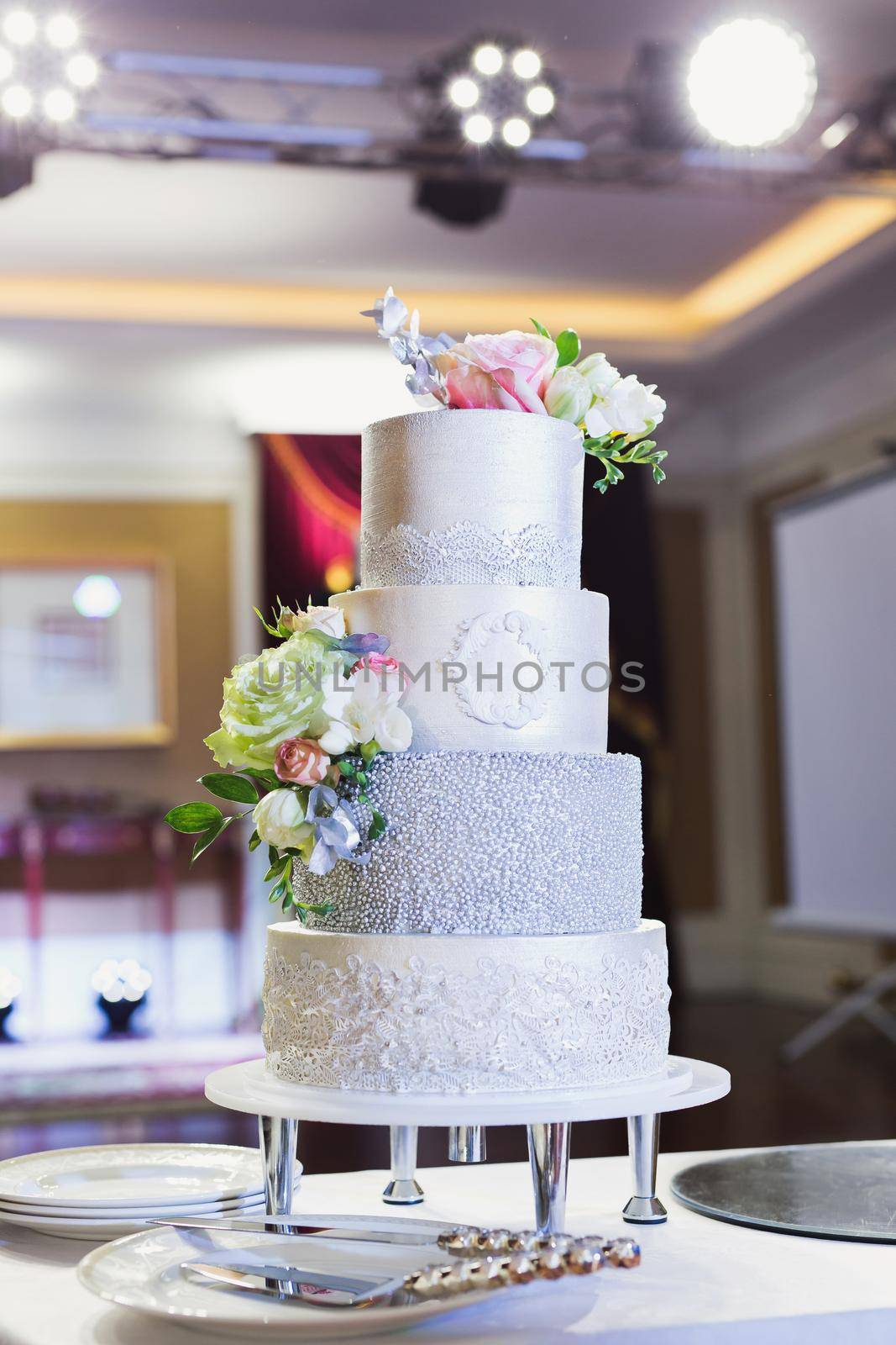 Beautiful wedding cake for the newlyweds at the wedding. A birthday cake at a banquet.