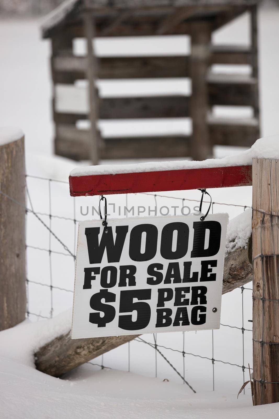 A Firewood for Sale Sign in a rural setting by markvandam