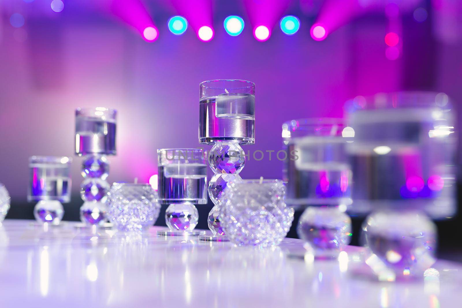 Crystal glasses as part of the wedding banquet table setting by StudioPeace