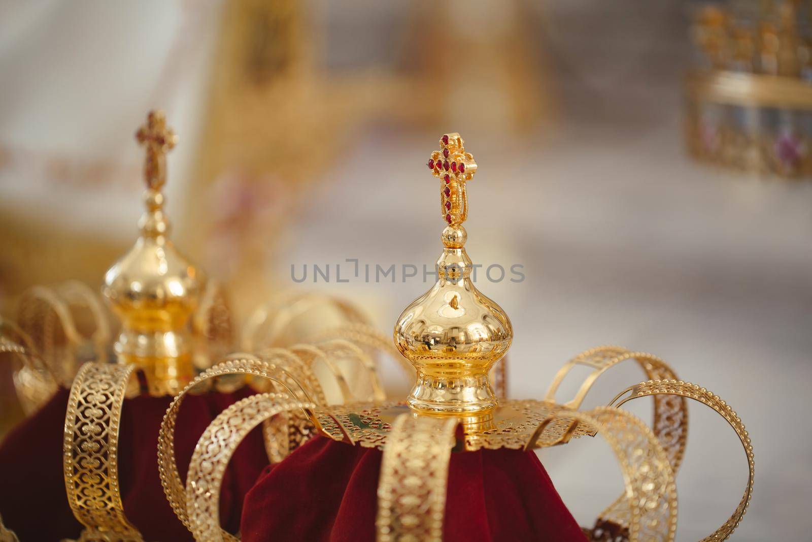 Wedding golden crowns ready for wedding ceremony in orthodox church by StudioPeace