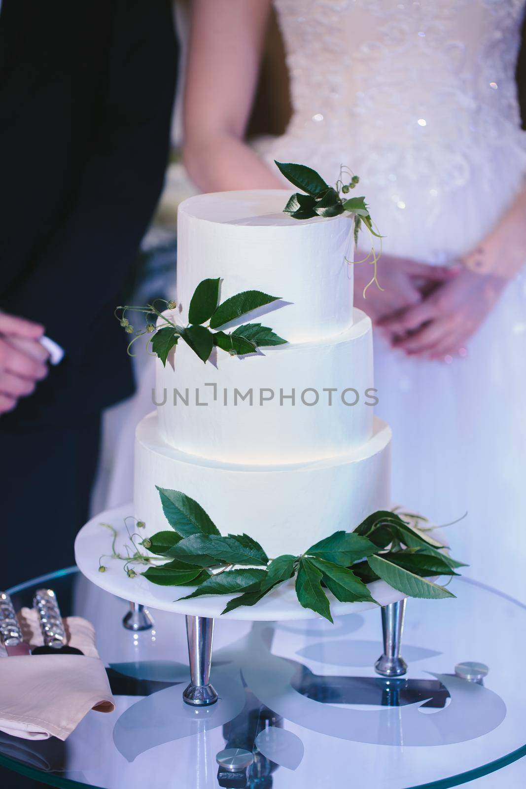 Beautiful wedding cake for the newlyweds at the wedding. A birthday cake at a banquet.