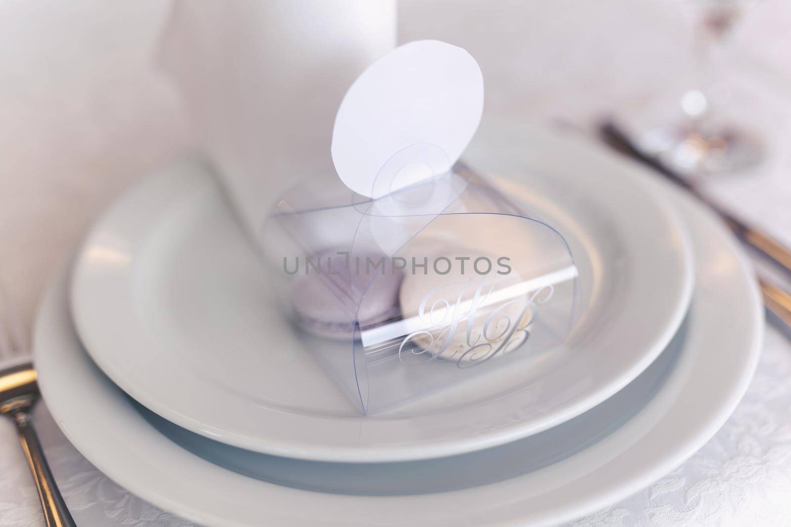 Serving a wedding banquet table in a restaurant with initials, name and date by StudioPeace