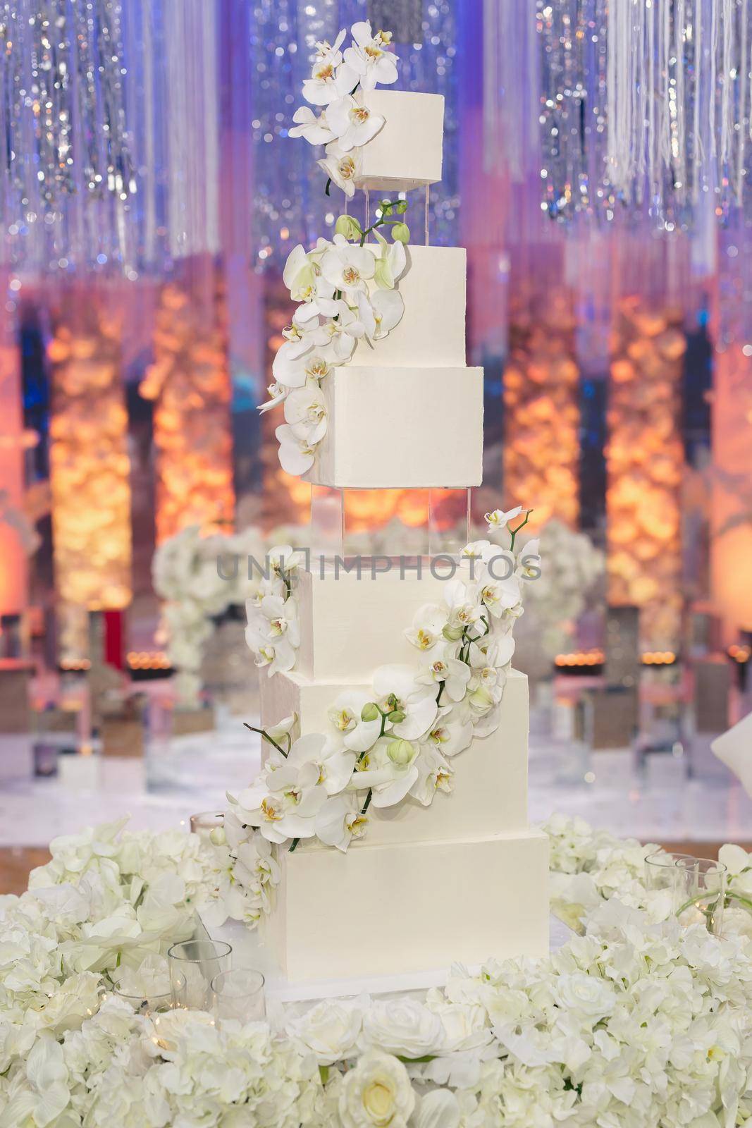 Beautiful wedding cake for the newlyweds at the wedding. A birthday cake at a banquet.