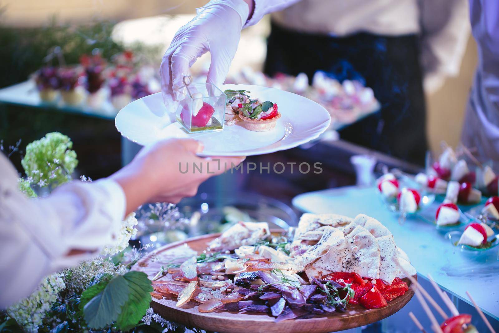 Buffet dinner, a beautifully decorated banquet with a variety of snacks by StudioPeace