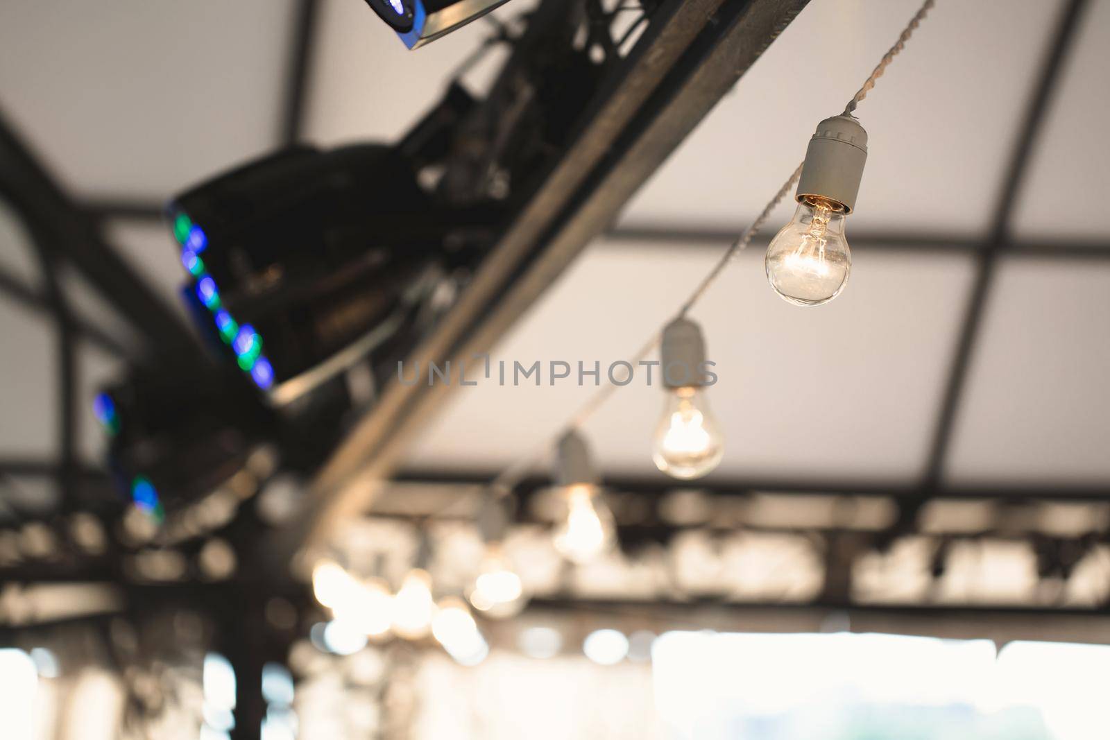 The decor of light bulbs in the restaurant hall.