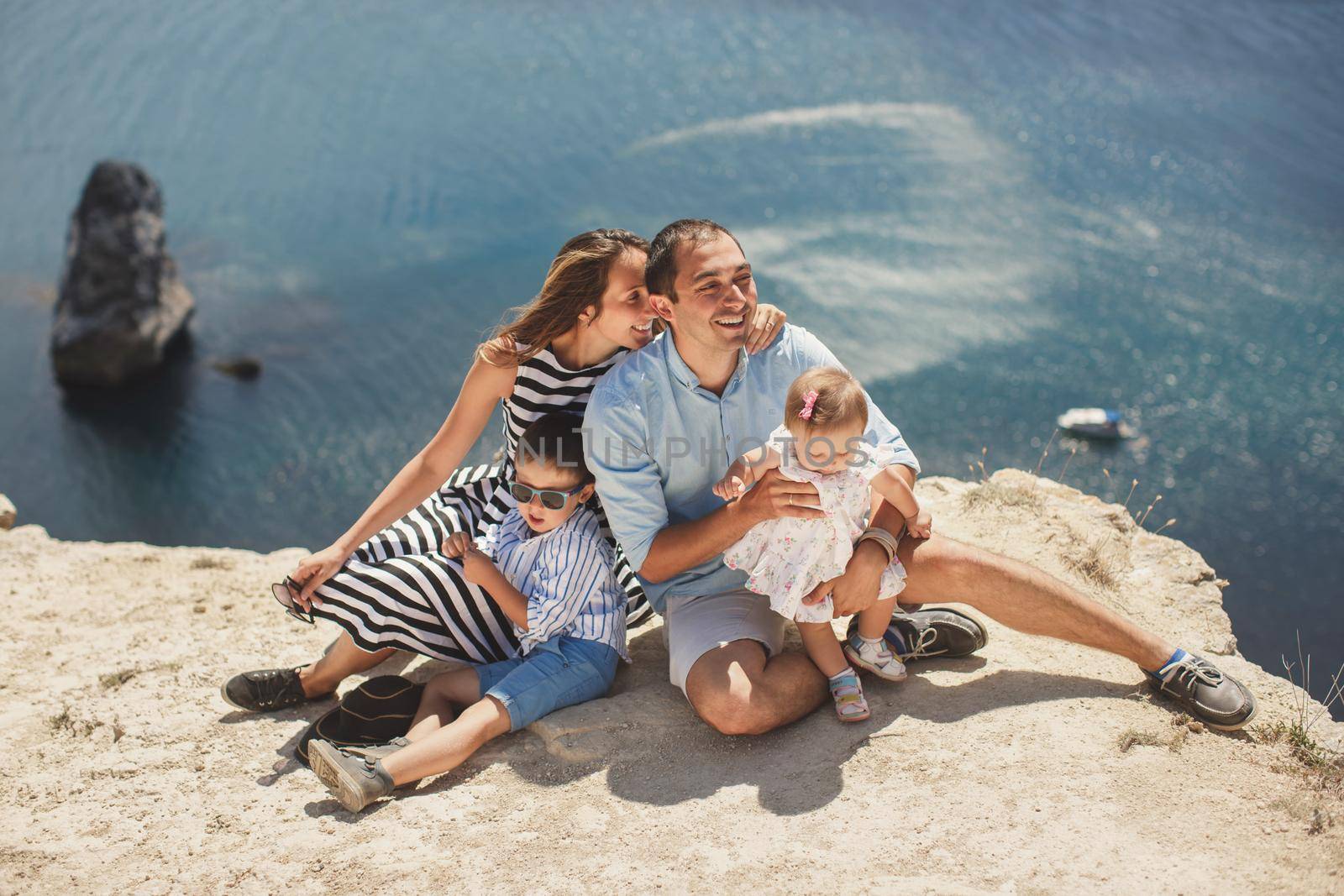 Portrait of a happy family in the mountains. The concept of family. Family trip.