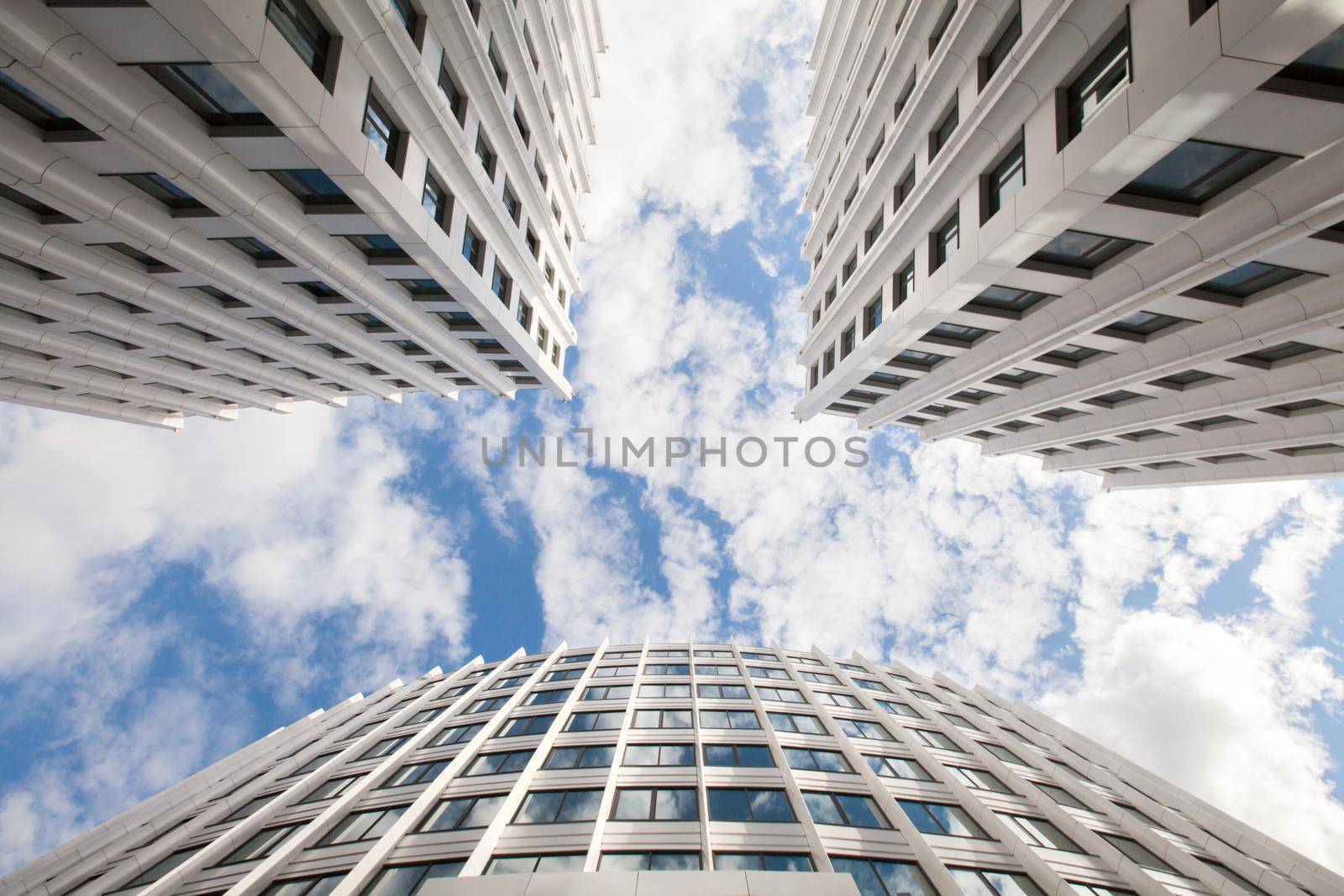 Bottom view of modern skyscrapers in the white business district