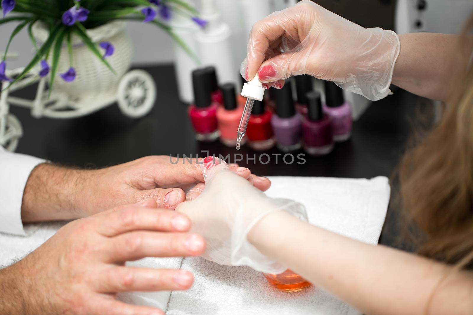 Manicure, Hands spa Cuticle oil. Beautiful man hands closeup. Manicured nails. Beauty hands. Beauty treatment by StudioPeace