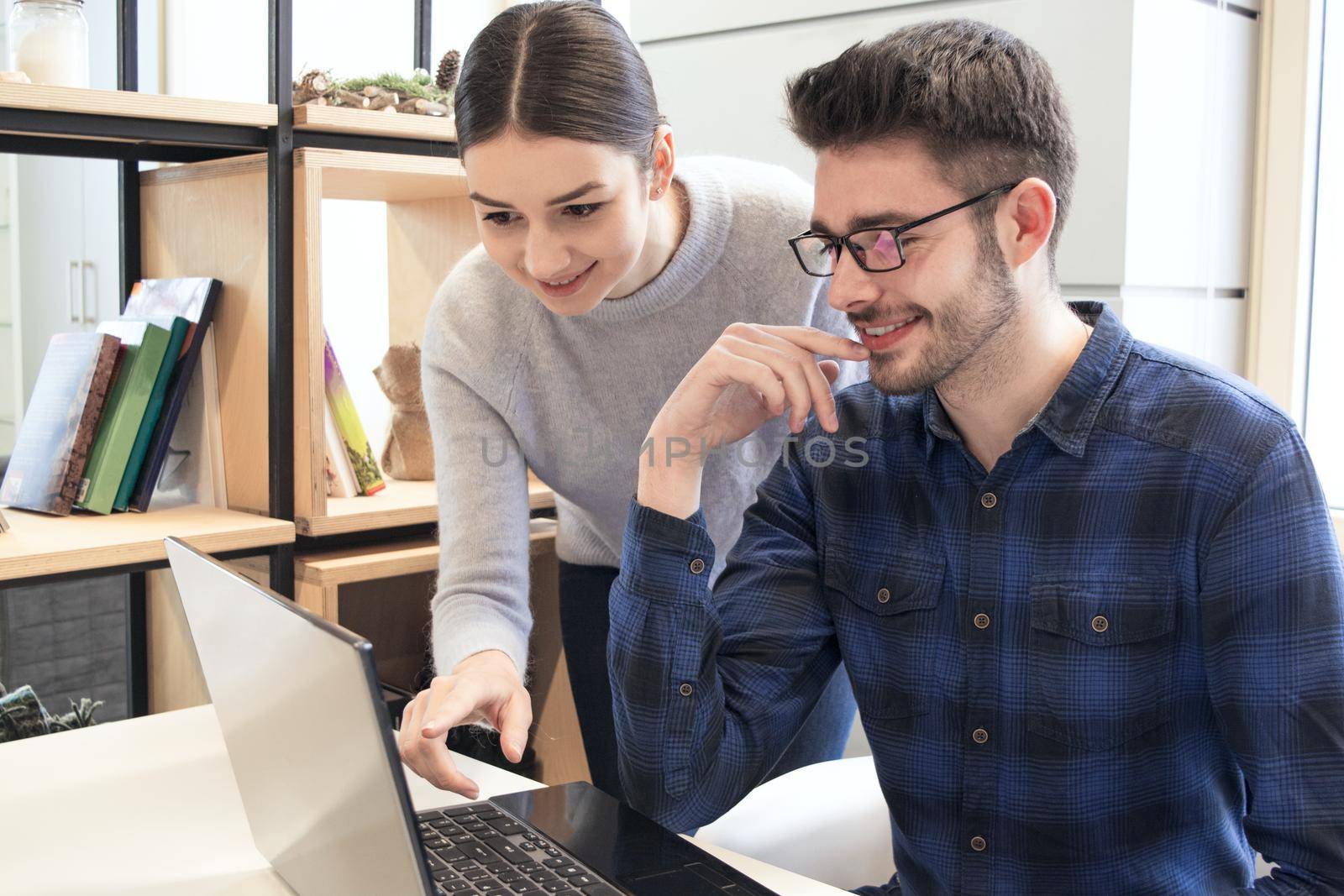 Students at workplace at college. Students class at campus. Digital library class and online webinar. Young girl and guy at School and online education concept.