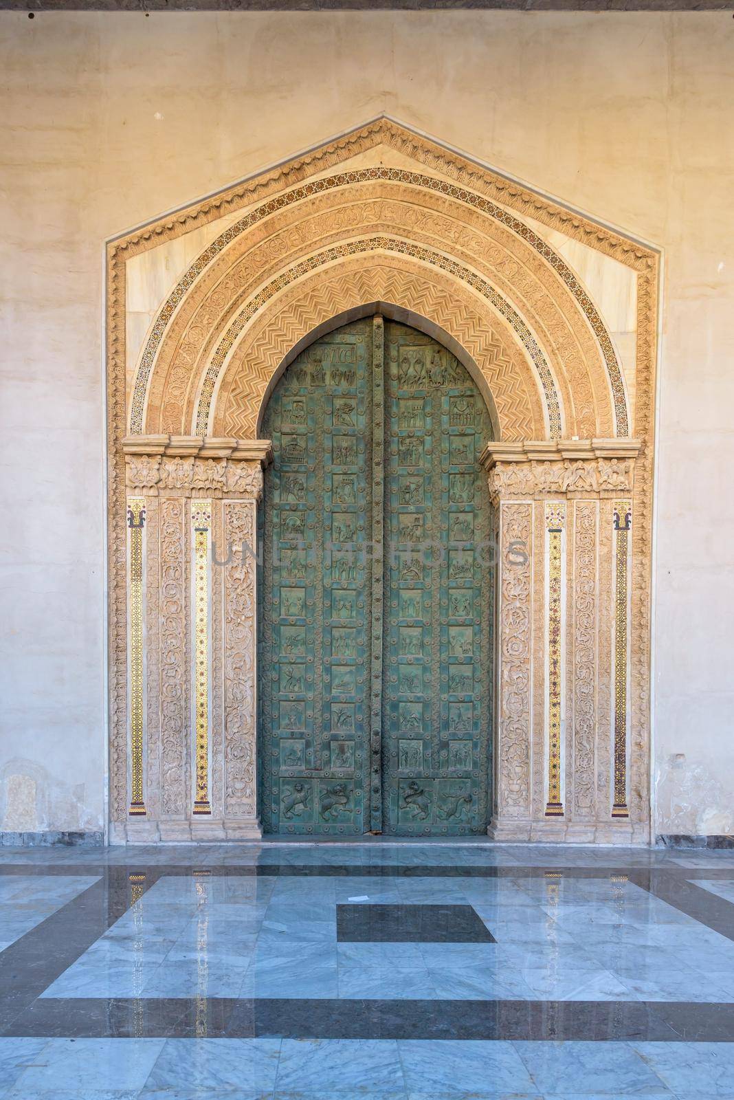 Decorated main bronze portal to the Cathedral of Monreale on Sicily