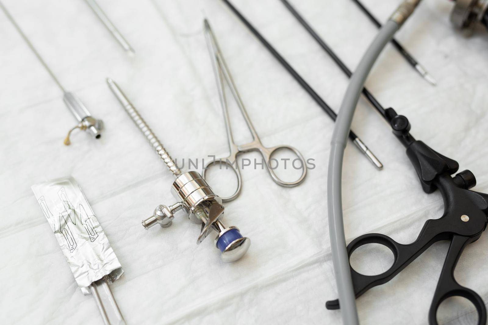 Laparoscopic instruments on the operating table in the surgical room