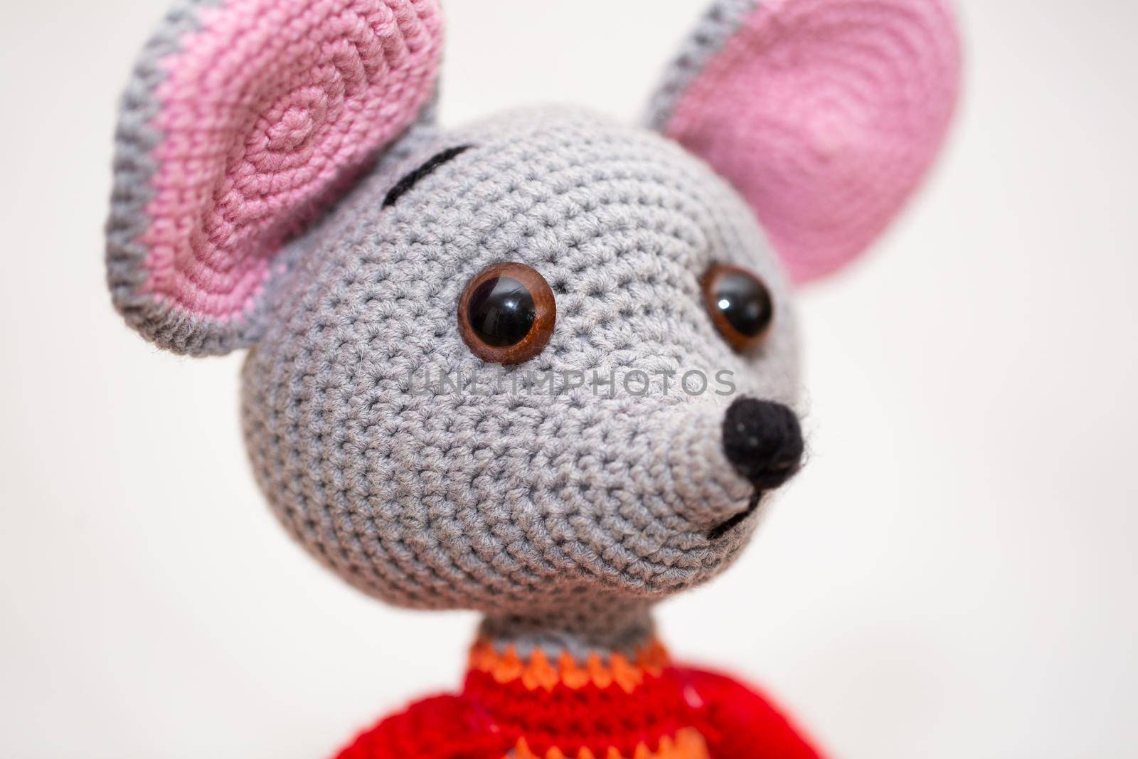 A knitted mouse. A soft toy as a symbol of the New Year by StudioPeace