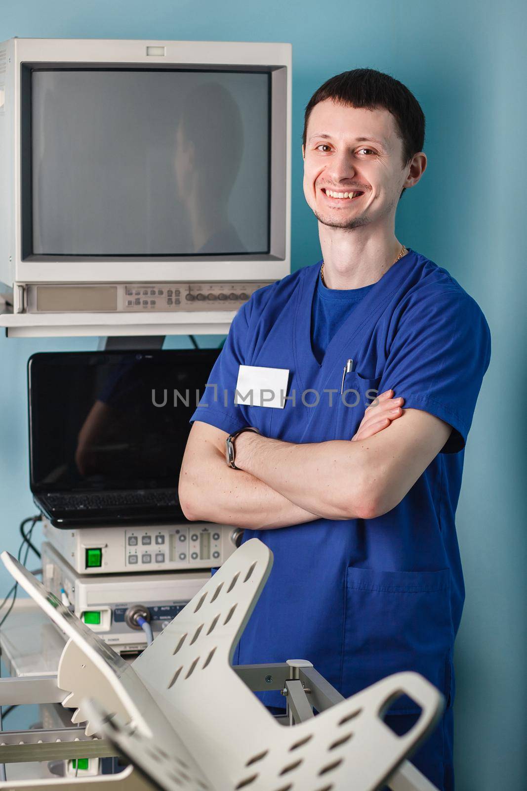 Portrait of a male veterinarian in the operating room. by StudioPeace