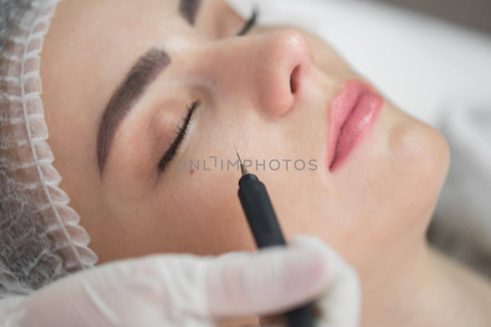 Ultrasonic cavitation, facial cleansing in the cosmetology office. by StudioPeace