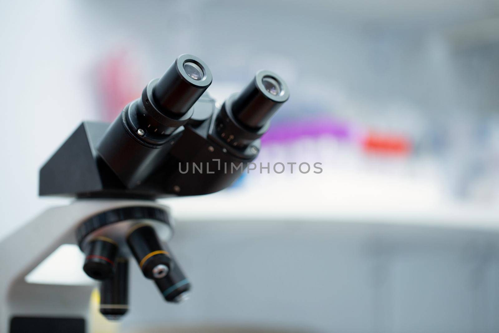 Laboratory Microscope. Scientific and healthcare research background by StudioPeace