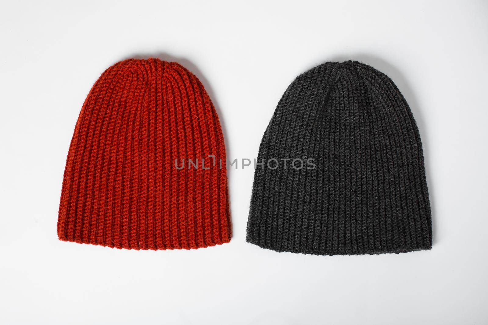 knitted hat in red and black on a white background