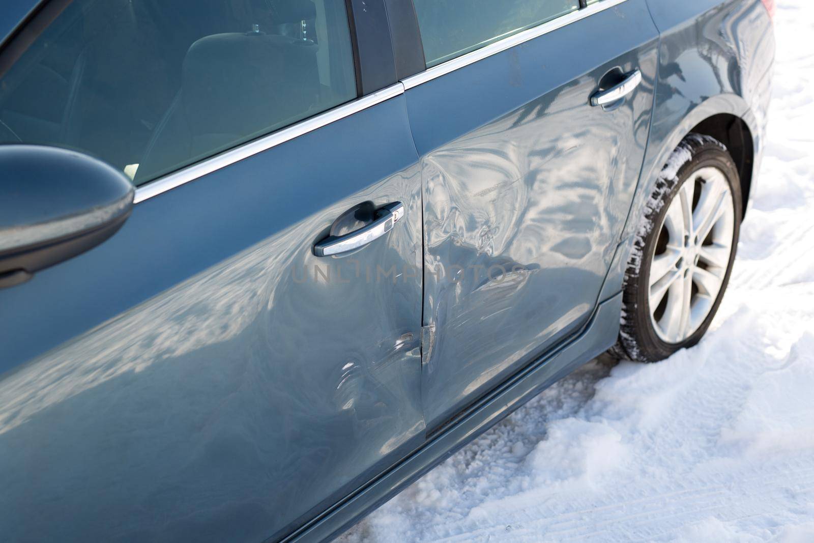 Sheet metal damage to blue car. Traffic Accident. by StudioPeace