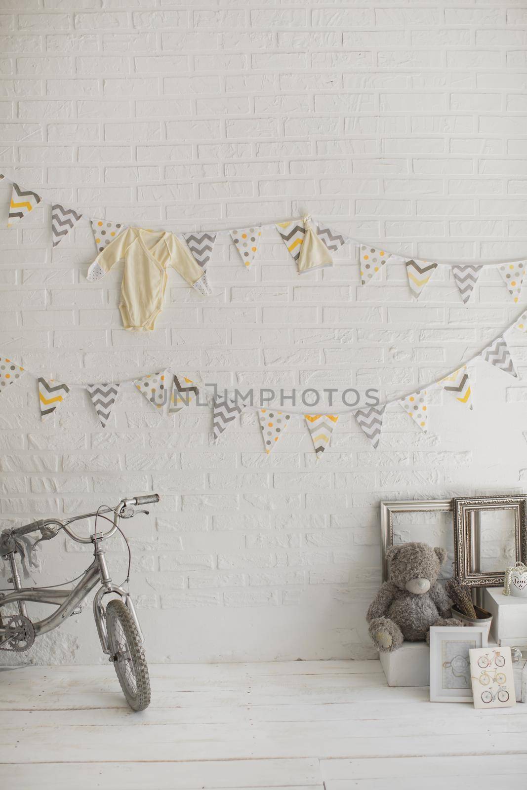 A Bicycle, a toy bear and flag in white Studio. by StudioPeace