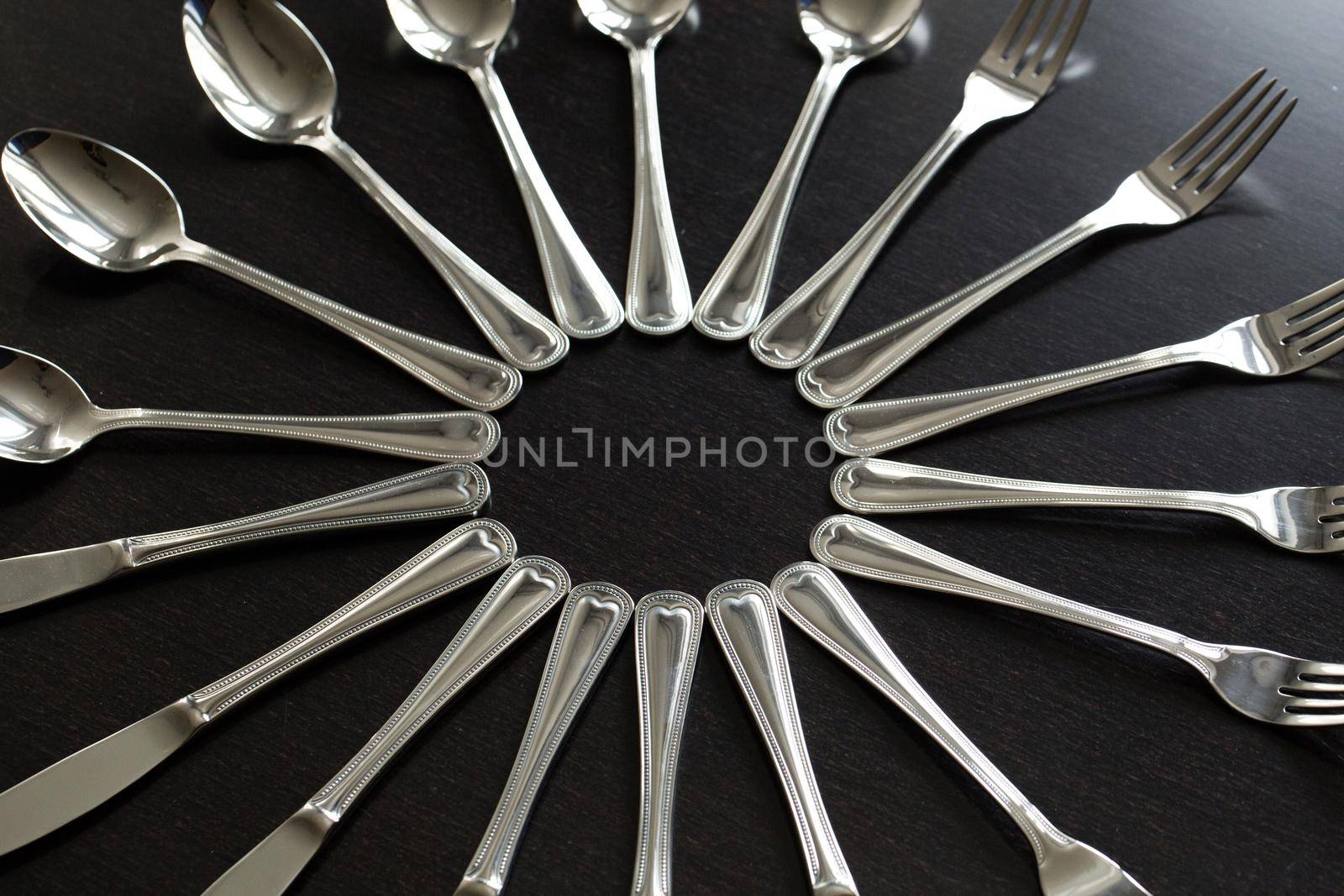 Cutlery on a black background. Fork, spoon, knife by StudioPeace