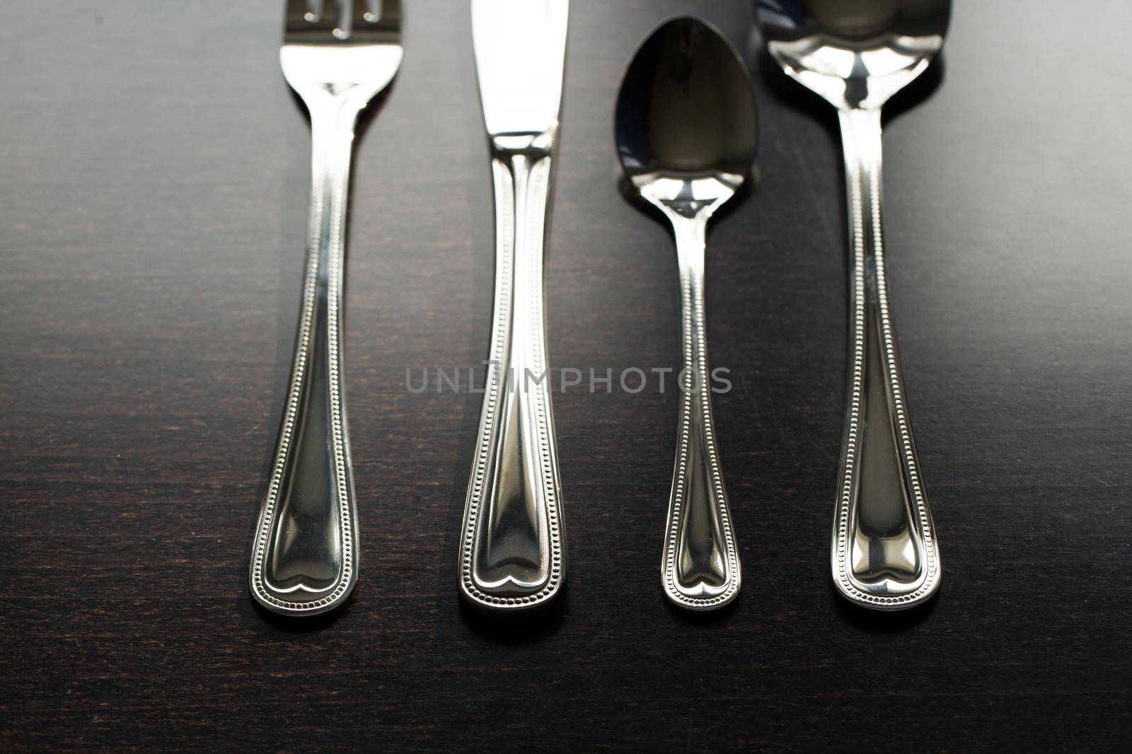 Cutlery on a black background. Fork, spoon knife