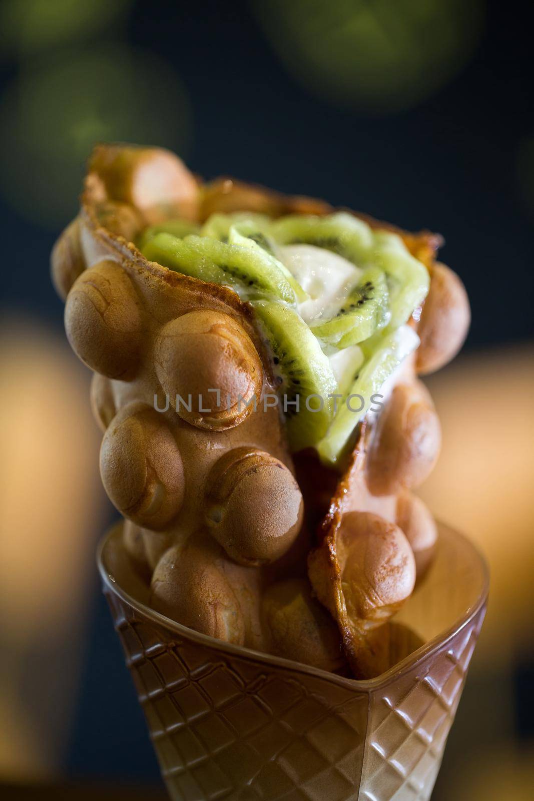 Hong Kong style egg waffle with kiwi. by StudioPeace