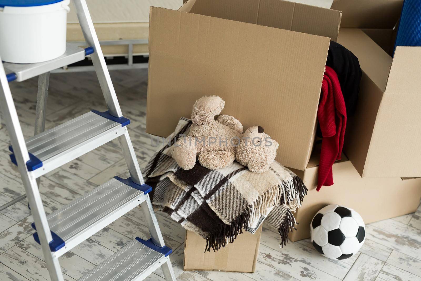 Packed household stuff for moving into new house. by StudioPeace
