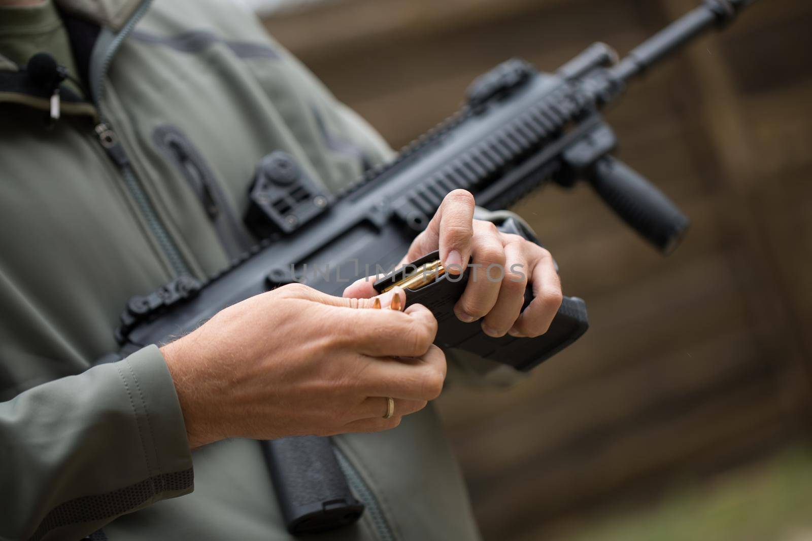 Loading ammunition into a clip. Reloading weapons