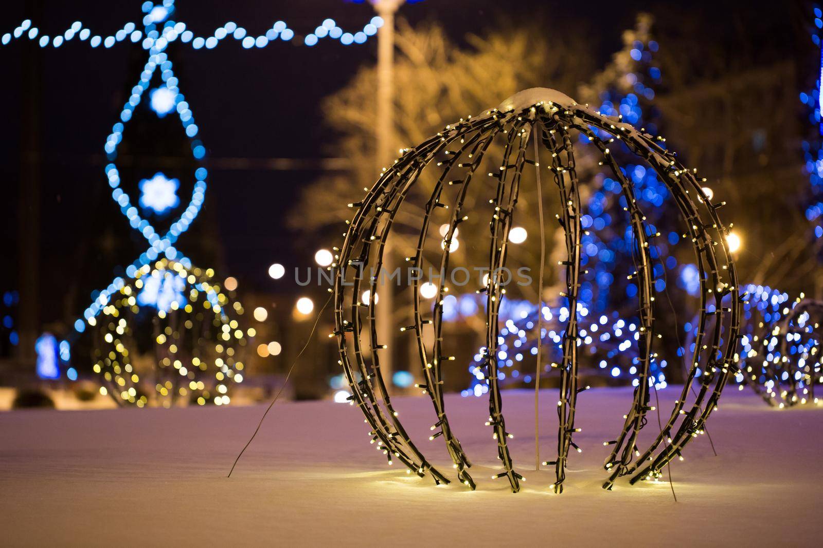 Christmas tree on the main Square on a winter night in snow