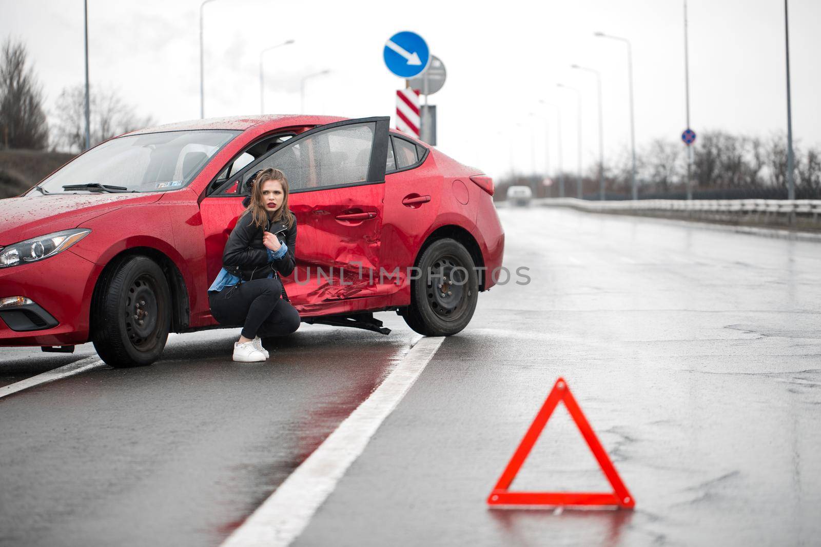 driver is standing near his car. concept of accident on the road. by StudioPeace
