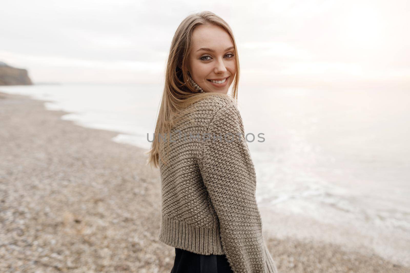 portrait of a young happy woman by splash