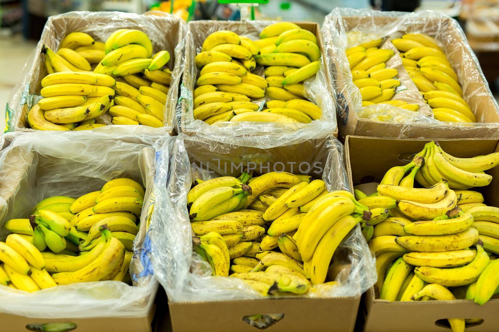 Bananas in the boxes in the supermarket