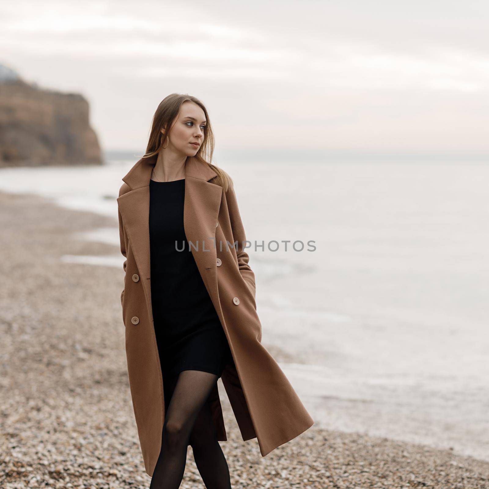 portrait of a young happy woman by splash