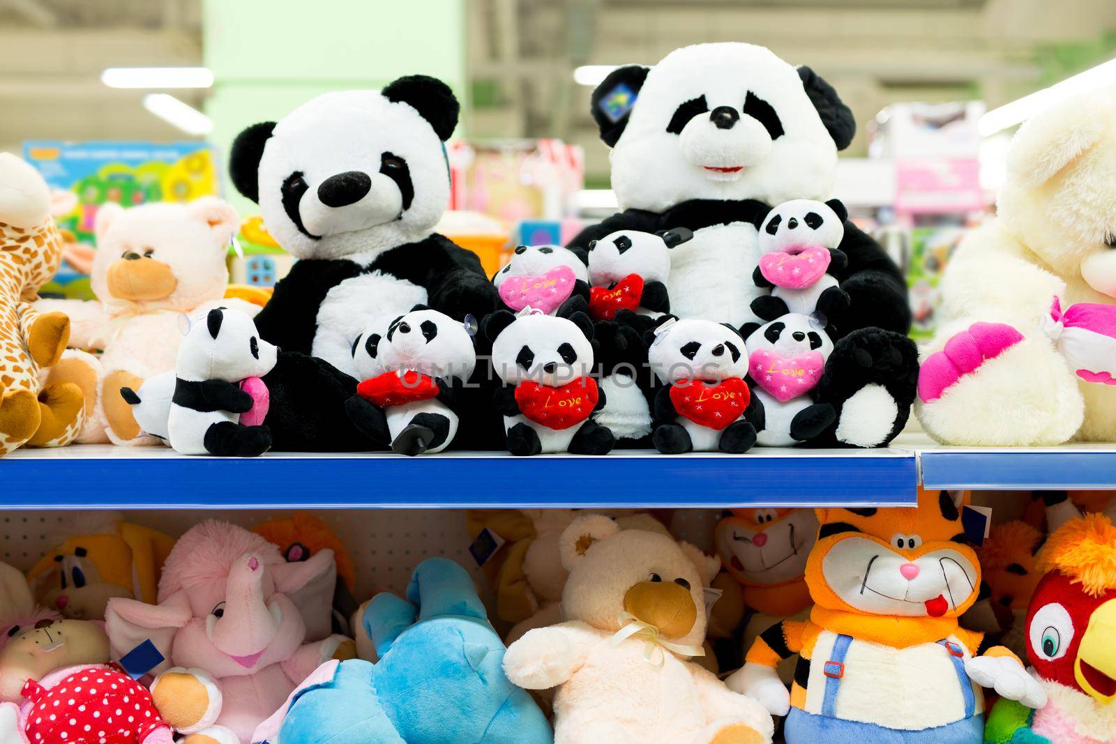 Sale of soft plush toys on the supermarket counter