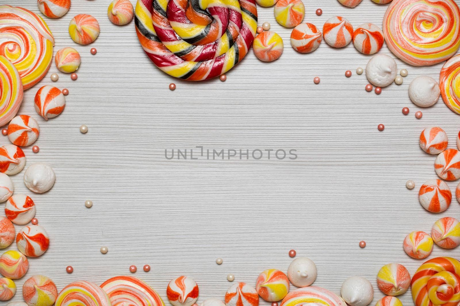 Tasty appetizing Party Accessories Happy Birthday Sweet Treat Swirl Candy Lollypop on Background Top View Fashion Conceptual Holiday Flat Lay